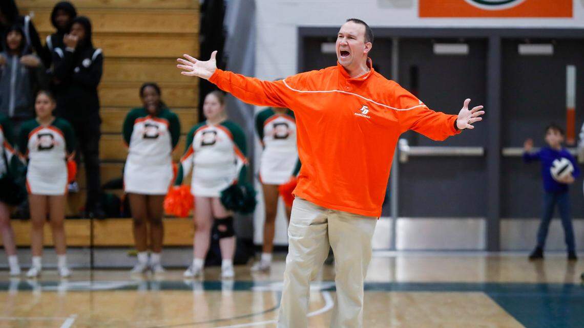 Frederick Douglass head coach Wes Scarberry calls to his players during a game against Madison Central on Jan. 20.