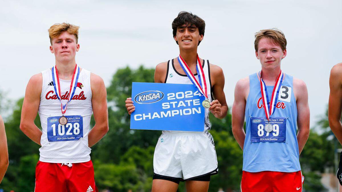 North Oldham’’s Adam Patel, center, is flanked by George Rogers Clark’s Cooper Wasson, left, and Conner’s Joey Carroll. All three broke a 3,200 meter race record in the KHSAA Class 3A State Track and Field Championships at the University of Kentucky’s Outdoor Track and Field Facility on Saturday.