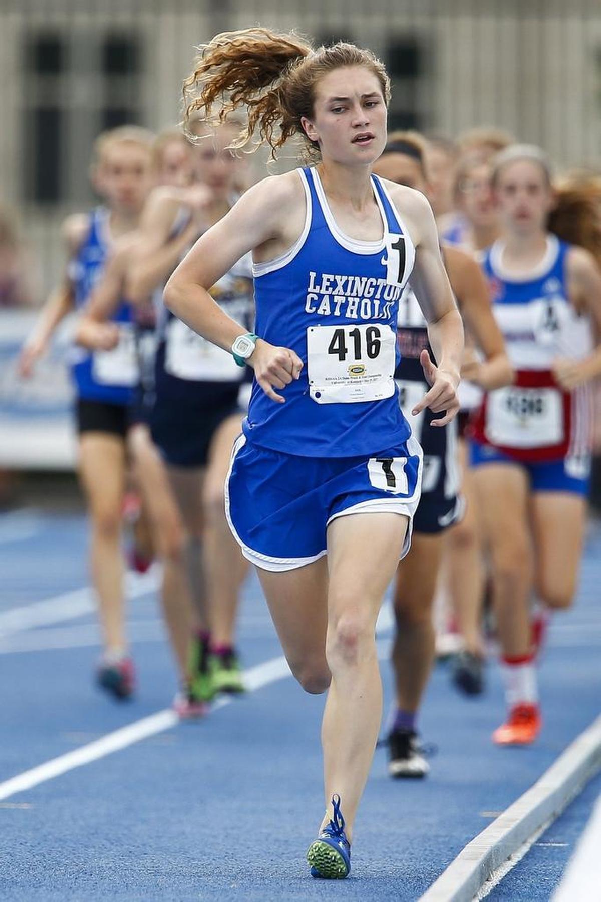Lexington Catholic's Michaela Reinhart (416) competes in the girls 1,600-meter run during the 2017 KHSAA Track & Field 2A State Meet at the University of Kentucky in Lexington, Ky., Friday, May 19, 2017. Reinhart finished first with a time of 4:58.53.