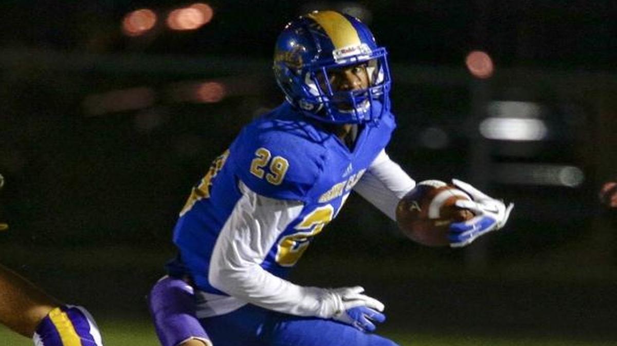 Henry Clay's Tyree Clarke, ran over Campbell County's Logan Harrod in the first half of the Blue Devils’ 21-14 road win.