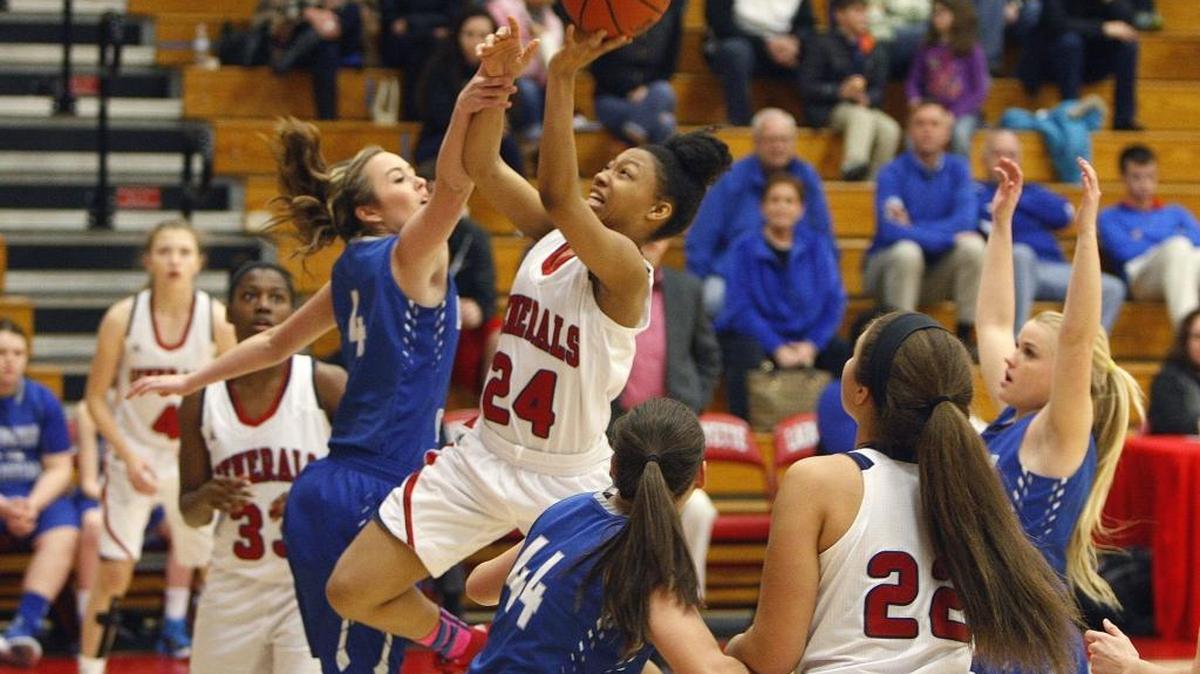 Lafayette's Terri Abram shoots against Lexington Christian in the semifinals of the 43rd district basketball tournament at Lafayette's Jackson-Carlisle Gymnasium in Lexington, Ky., Wednesday, February 24, 2016.