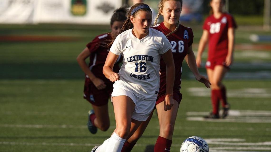 Lexington Catholic's Kennedy Tranter dribbles against Assumption at Joseph Ford Stadium in Lexington, Ky., Monday, August 22, 2016.