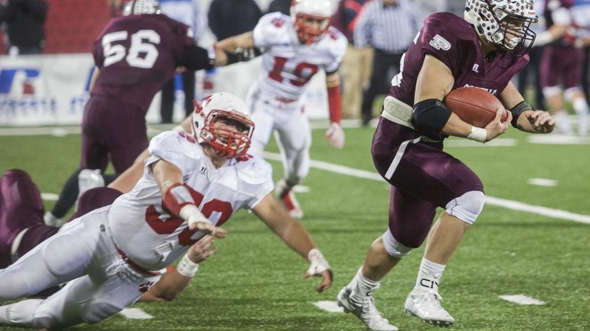 Pikeville running back Daric Pugh carries the ball against Beechwood during the Class 1A state championship football game Thursday, Dec. 3, 2015, in Bowling Green, Ky. Pikeville won 42-28.