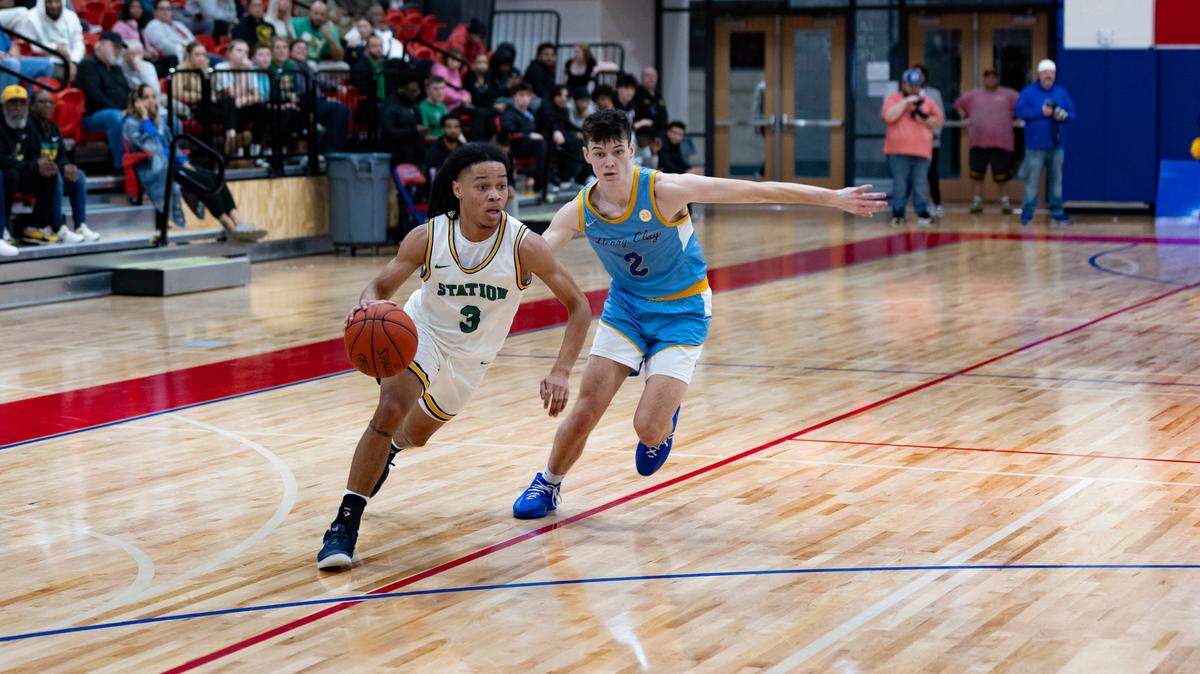 Bryan Station’s Justin Richmond (3) drives to the basket ahead of Henry Clay’s Kade Hilander (2) during the Defenders’ 60-48 win in the 42nd District Tournament semifinals at Scott County High School’s Billy Hicks Gymnasium in Georgetown on Wednesday.