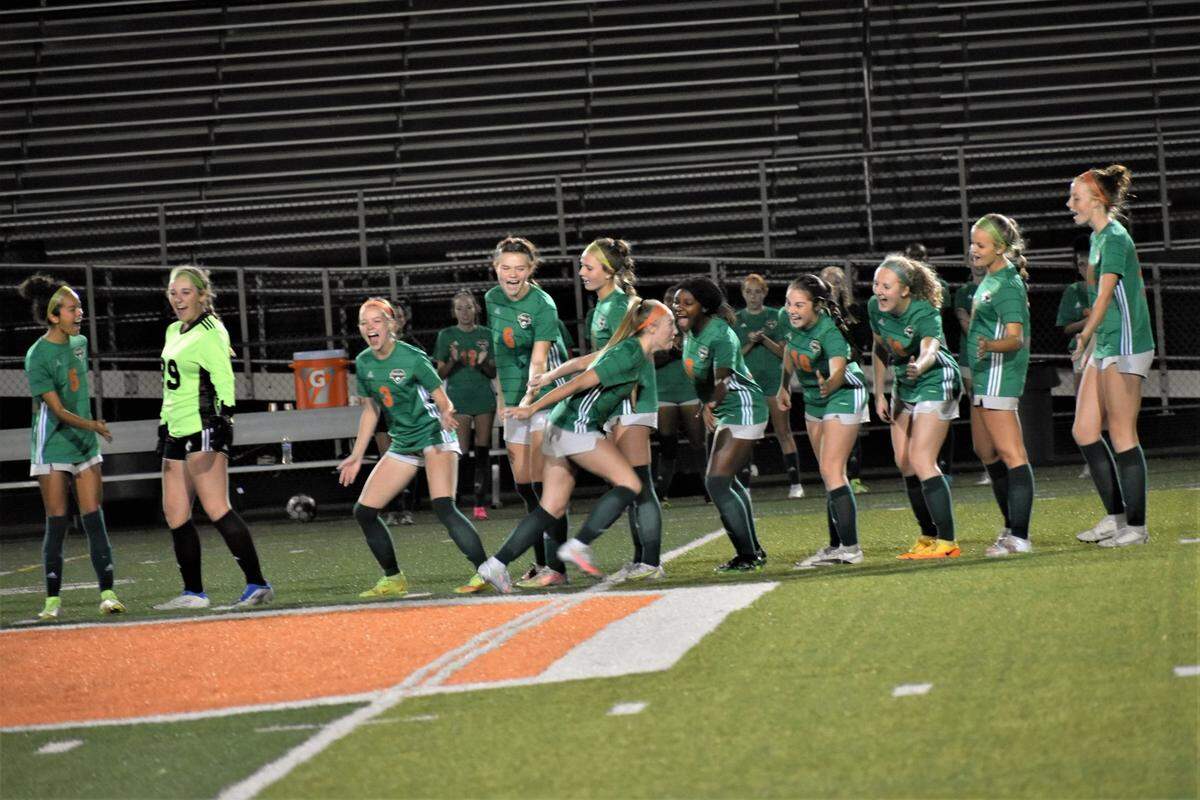 Frederick Douglass goes through its pregame introductions ritual at a game this season. The Broncos are the top seed in this week’s 42nd District girls’ high school soccer tournament.