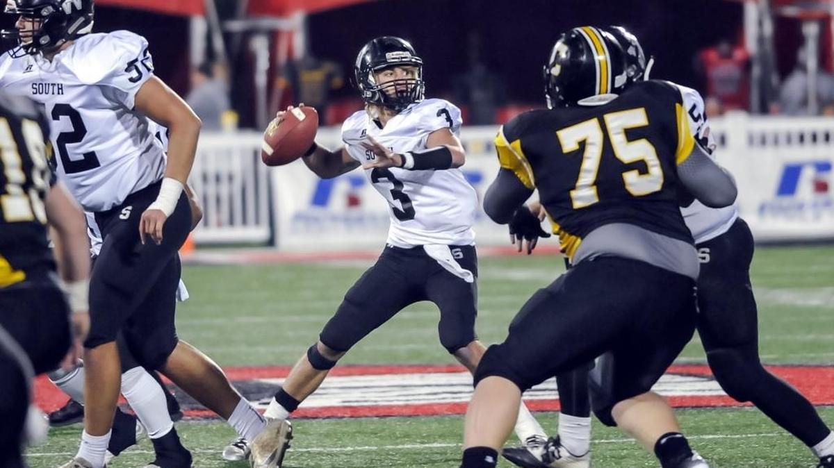 South Warren's Ryder Litten (3) drops back to pass against Johnson Central during the KHSAA Class 4A championship high school football game in Bowling Green, Ky., Sunday, Dec. 6, 2015.