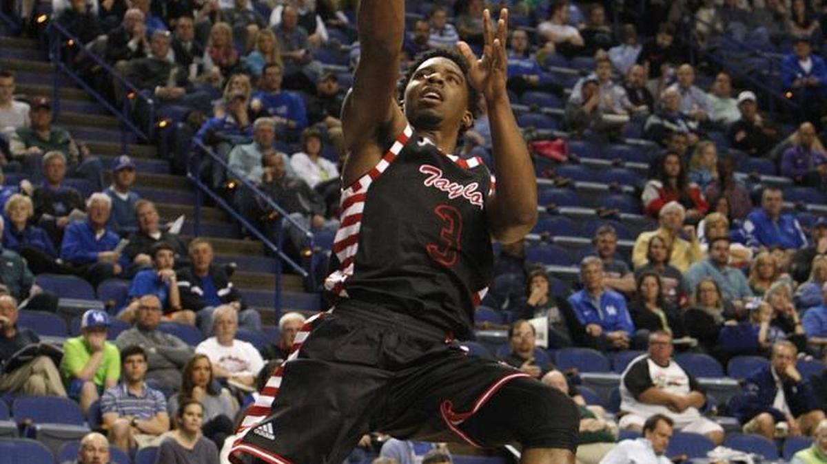 Taylor County's Quentin Goodin shoots against Mason Co. in game 7 of the Whitaker Bank/KHSAA Sweet 16 boys' state basketball championship in Lexington, Ky., Thursday, March 16, 2016.