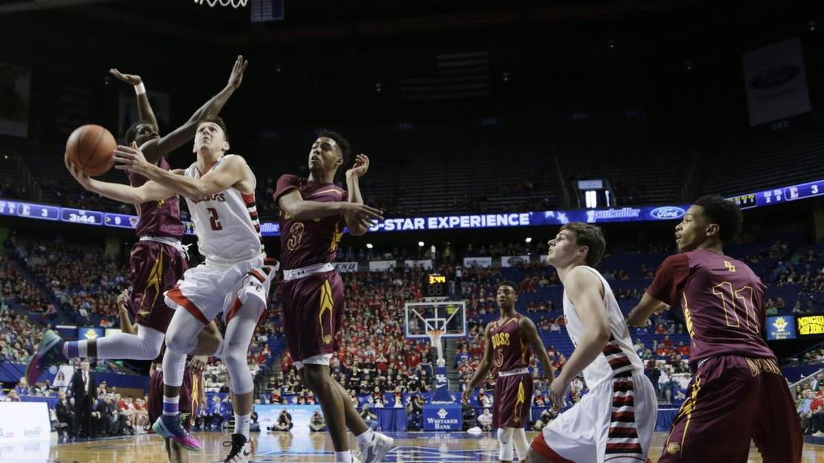 Lawrence County's Austin Chaffins (2) tried for a basket in the first quarter of the Lawrence County vs. Doss 2016 Whitaker Bank/KHSAA Boys Sweet 16 basketball tournament at Rupp Arena in Lexington, Ky., on March 17, 2016. Doss led at halftime.