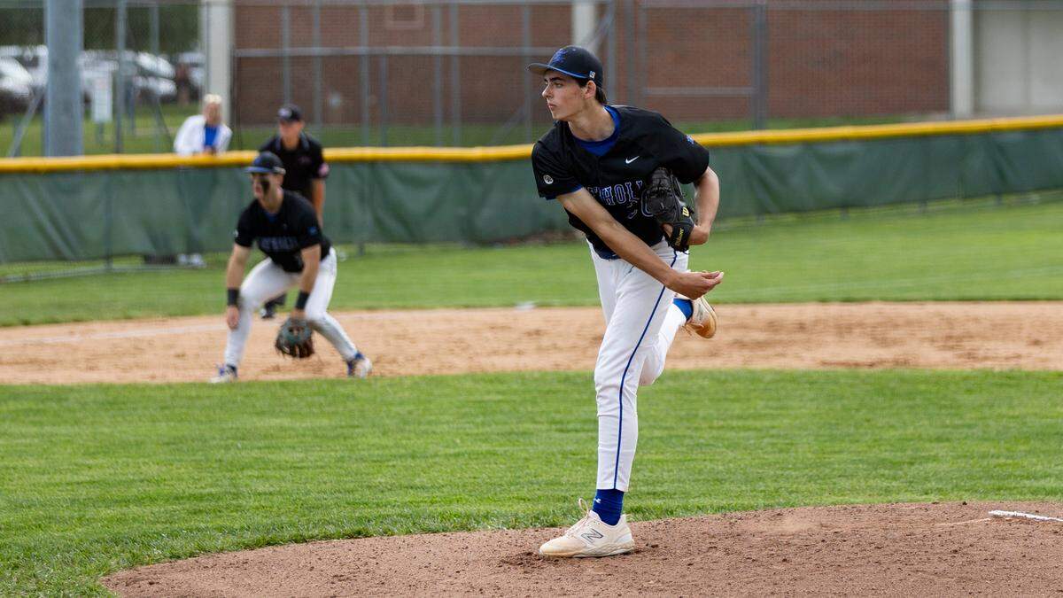 Lexington Catholic senior right-hander Jack Reeves delivers a pitch during the Knights’ 2-1 win over Lexington Christian in the 43rd District Tournament championship game at Lafayette on Wednesday.