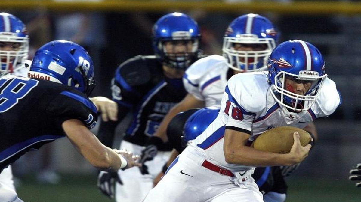 Madison Central quarterback Zachary Hardin ran against Lexington Catholic in Lexington, Ky., Friday, September 16, 2016.