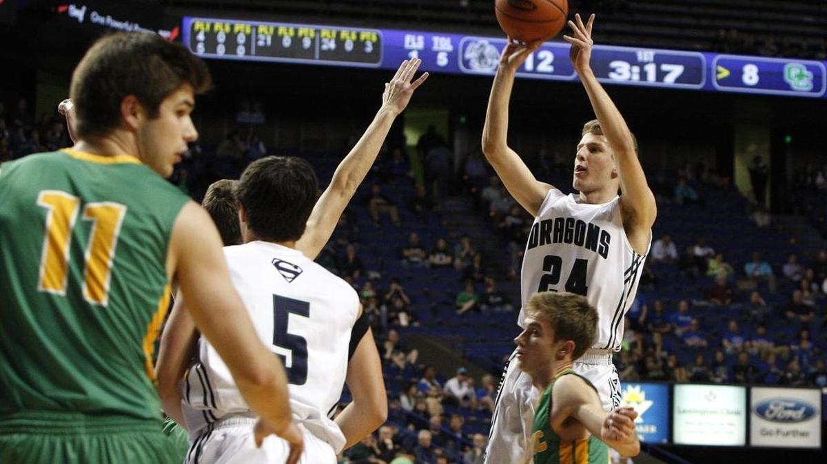 South Oldham's Trent Bouvet shoots against Owensboro Catholic in game 8 of the Whitaker Bank/KHSAA Sweet 16 boys' state basketball championship in Lexington, Ky., Thursday, March 16, 2016.