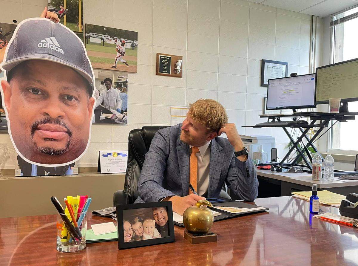 Paris Independent Schools superintendent Stephen McCauley worked under the watchful eye of an Ivan K. Rice fathead made ready for that night’s football game back in 2021.