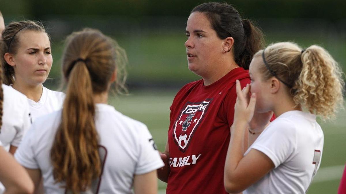 Tates Creek Coach Ally Tucker talked to her team before playing against Boyle County in the Fayette County Soccer Spectacular last year.
