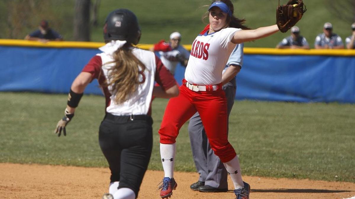 Scott County first baseman Sam Smith makes the catch to get McCracken County's Hannah Ridolfi out at Lois Holmes Field in Georgetown, Ky., Saturday, April 16, 2016.