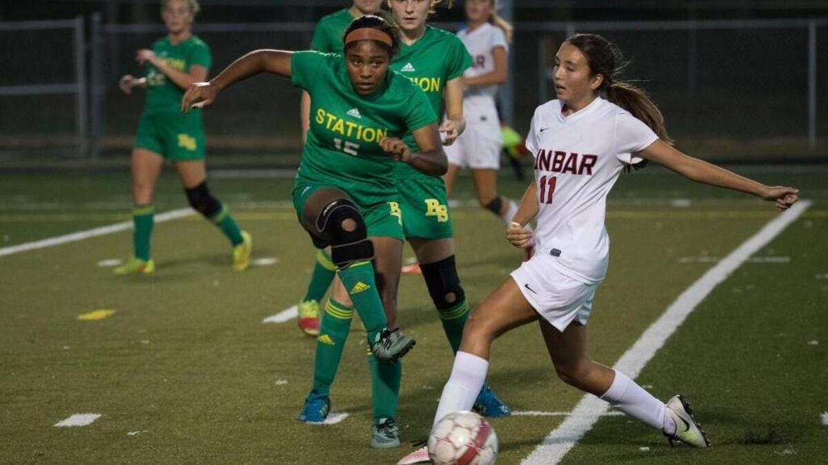 Bryan Station's Maya Johnson (15) defended as host Dunbar won 1-0 over Bryan Station on Wednesday Sept. 7, 2016 in Lexington, Ky.