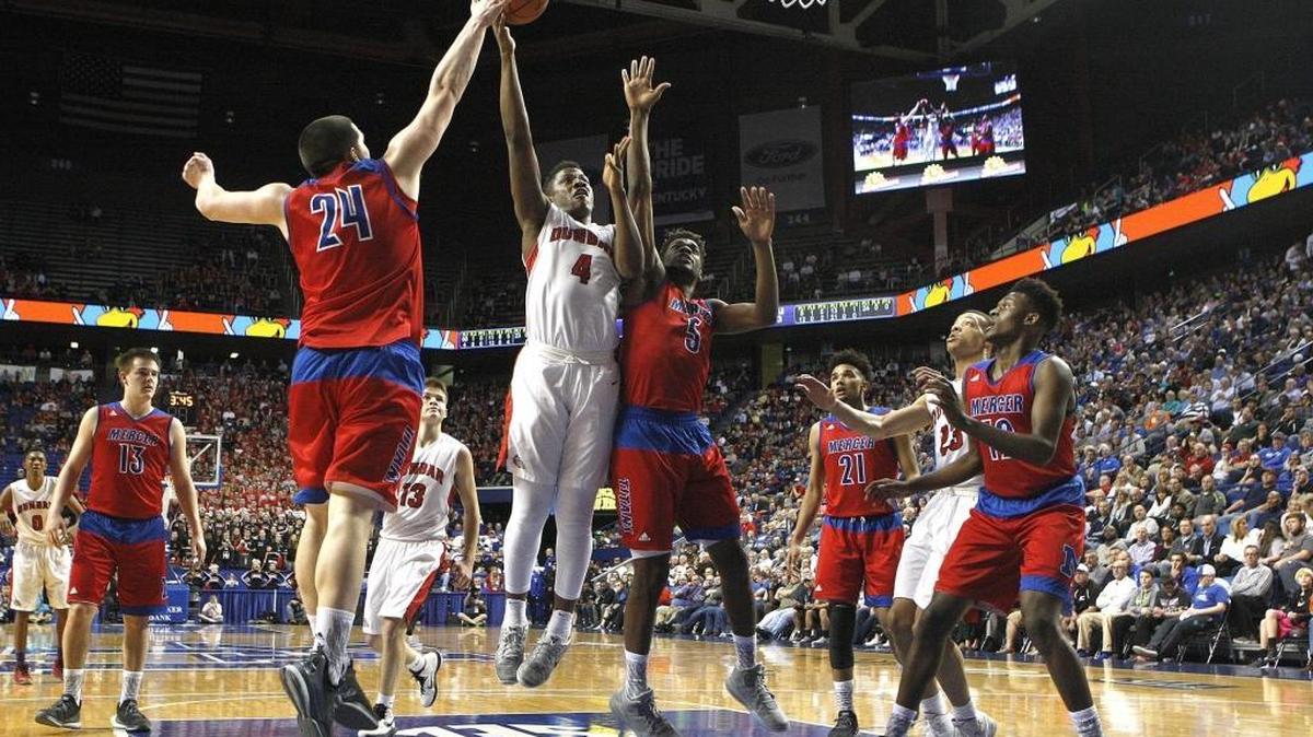 Paul Dunbar's Dontell Brown shoots against Mercer Co. in game 4 of the Whitaker Bank/KHSAA Sweet 16 state basketball championship in Lexington, Ky., Wednesday, March 16, 2016.