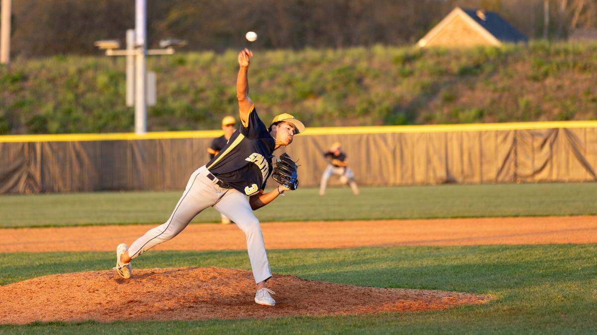 Sayre’s Jaxson Howard uses his full 6-foot-6 frame to deliver his pitches to the plate as he did for his first save of the season at Scott County High School in Georgetown on Wednesday.