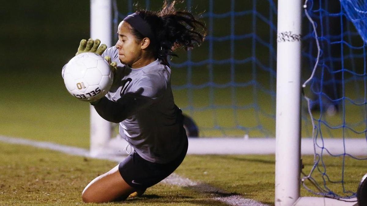 Tates Creek's Jenna Shalash (0) blocks a shot during their 43rd District semifinal soccer game against Paul Laurence Dunbar at Lexington Christian Academy in Lexington, Ky., Wednesday, Oct. 11, 2017. Tates Creek beat Paul Laurence Dunbar 3-2 on Penalty Kicks.