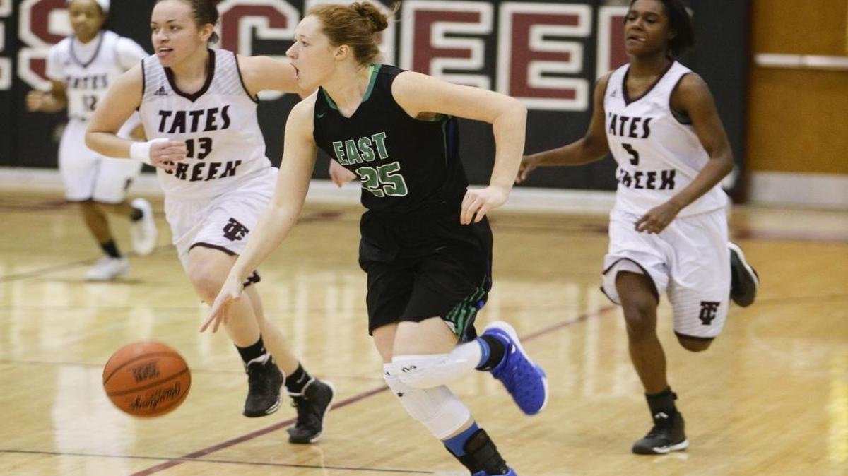 East Jessamine’s Emma Young scored on the Tates Creek defense on Wednesday February 10, 2016 in Lexington, Ky.