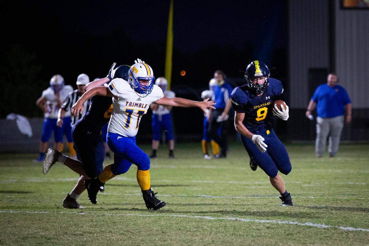 Sayre’s Luke Pennington ran the ball during their game against the Trimble County Raiders back in 2020. Now a sophomore, he’s the starting quarterback of the 2-0 Spartans.