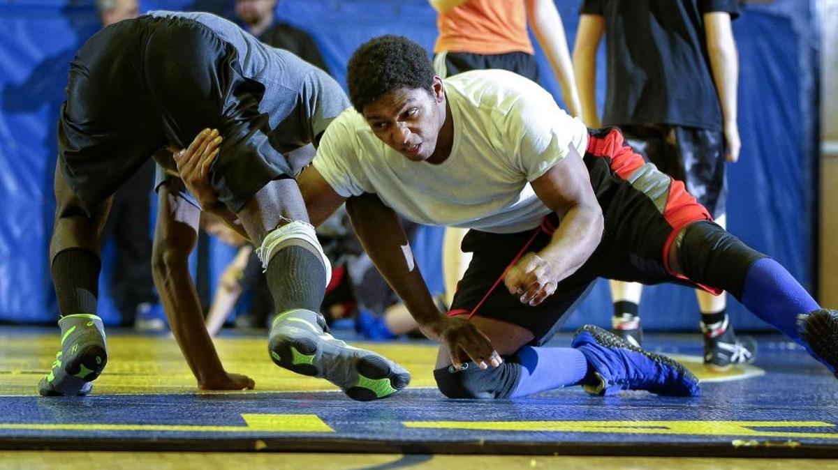 Henry Clay wrestler Ray-Karl Irving, right, wrestled with Will Lawson at practice on Tuesday January 31, 2017 in Lexington, Ky.