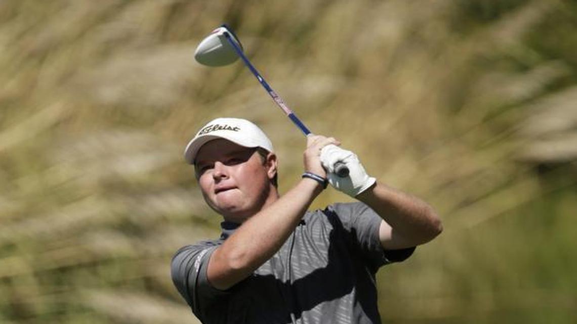 Franklin County’s C.J. Jones teed off the ninth hole during the boys' 9th Region golf tournament at Kearney Hill Links Lexington, Ky, on Sept. 27, 2016.