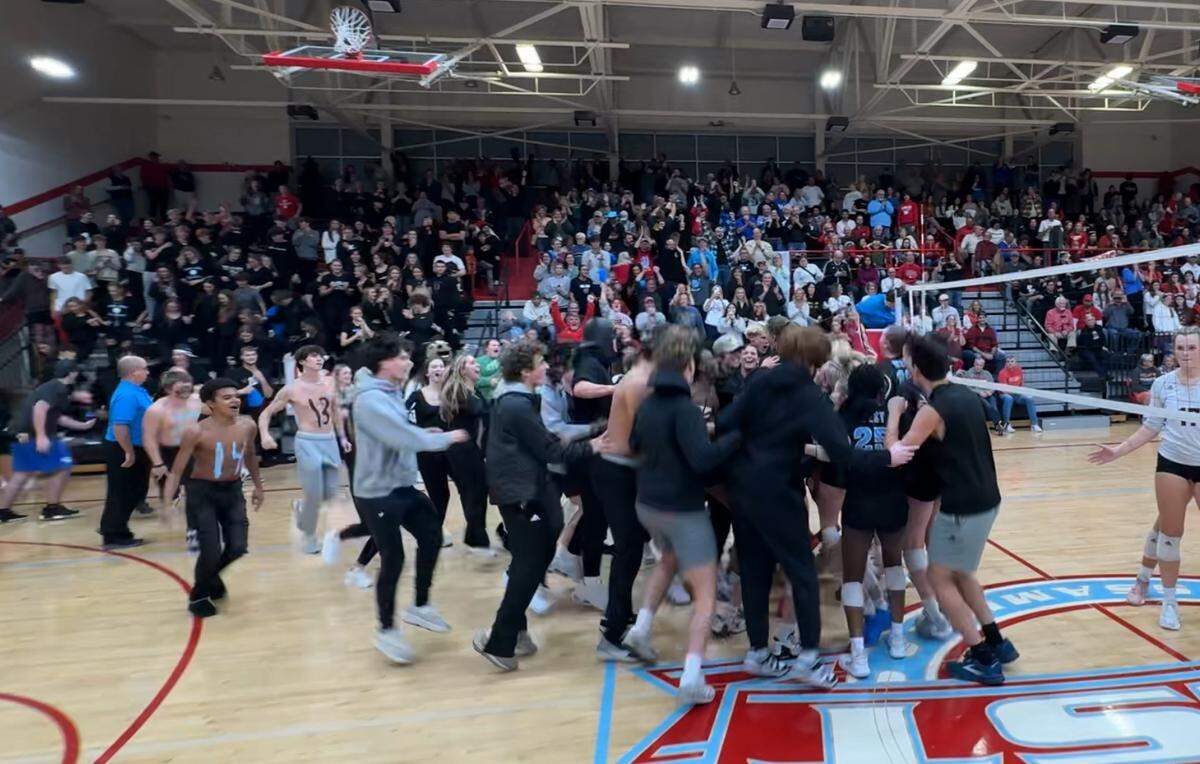 West Jessamine’s student section stormed the court after the Colts defeated Paul Laurence Dunbar 3-2 in the first round of the KHSAA State Volleyball Tournament at West Jessamine High School in Nicholasville on Monday night.