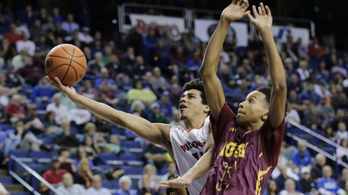 Lawrence County's Timmy Dalton (10) went to score in the second quarter of the Lawrence County vs. Doss 2016 Whitaker Bank/KHSAA Boys Sweet 16 basketball tournament at Rupp Arena in Lexington, Ky., on March 17, 2016. Doss led at halftime.