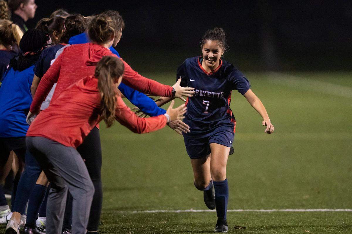 Lafayette’s Grecia Lara Martinez celebrates with the Generals’ bench after she scored a goal against the Paul Laurence Dunbar during the 43rd District Tournament last year. See returns this season as a senior.