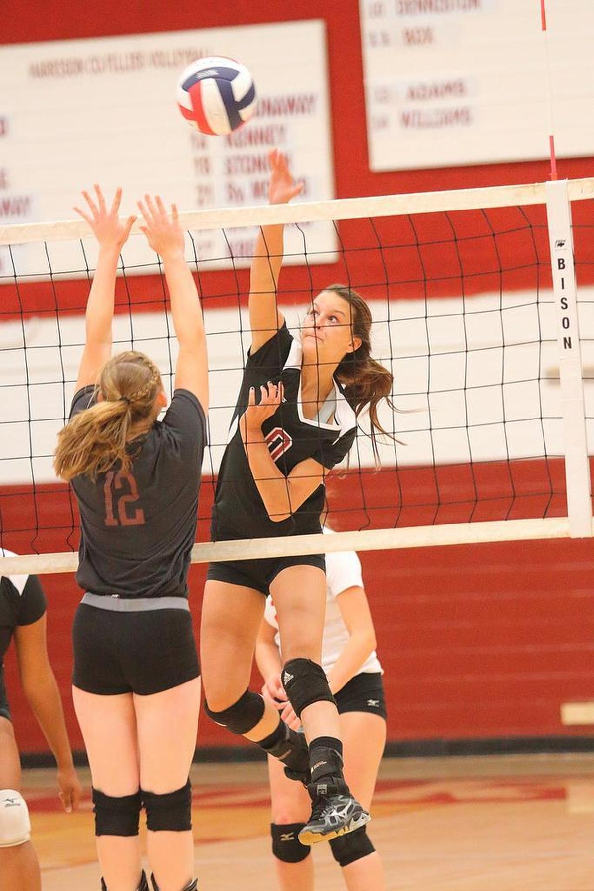 Harrison County junior Kelsey Gifford hit the ball over the net during a high school volleyball match. The Fillies are undefeated heading into a match with Scott High School scheduled for Thursday, Oct. 12, 2017.