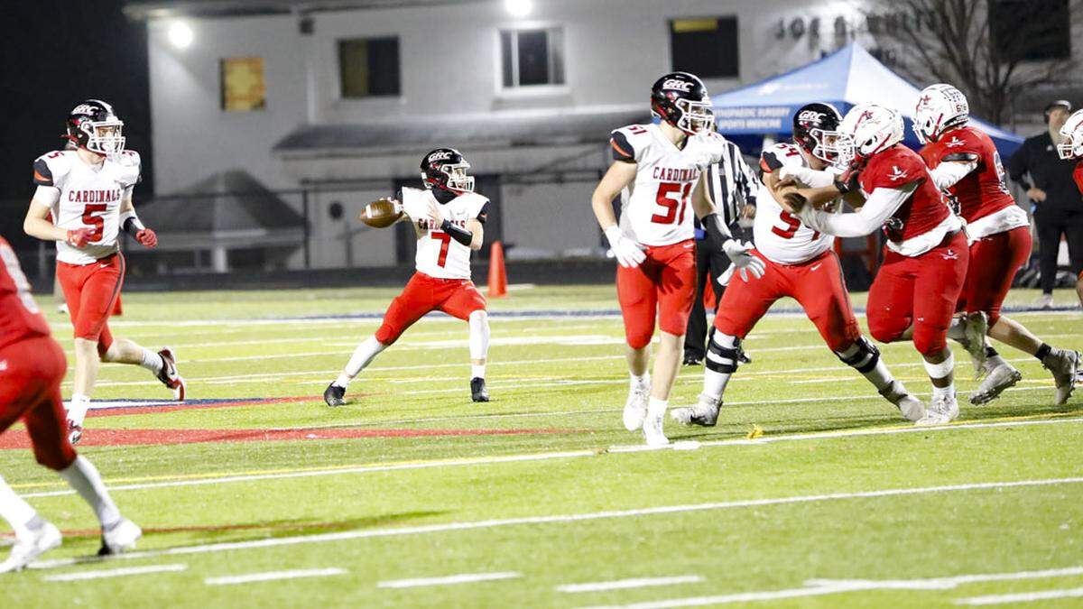 George Rogers Clark’s Sam Clements (7) dropped back to pass in the second half of the Cardinals’ 14-6 win at Lafayette in the Class 6A playoffs first round on Friday.