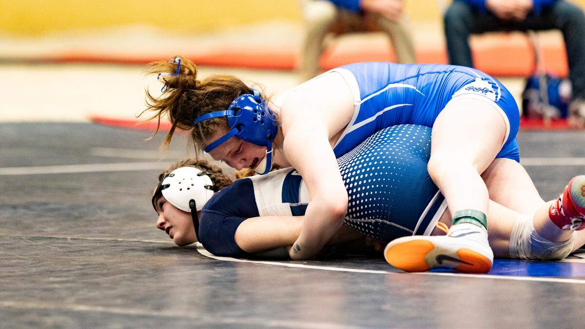 Walton-Verona’s Sophie Anderson, top, won her 132 finals match against Ohio County’s Talynn Clark and received the event’s most outstanding wrestler award at the 2025 KHSAA Girls State Wrestling Championships at Alltech Arena on Thursday.