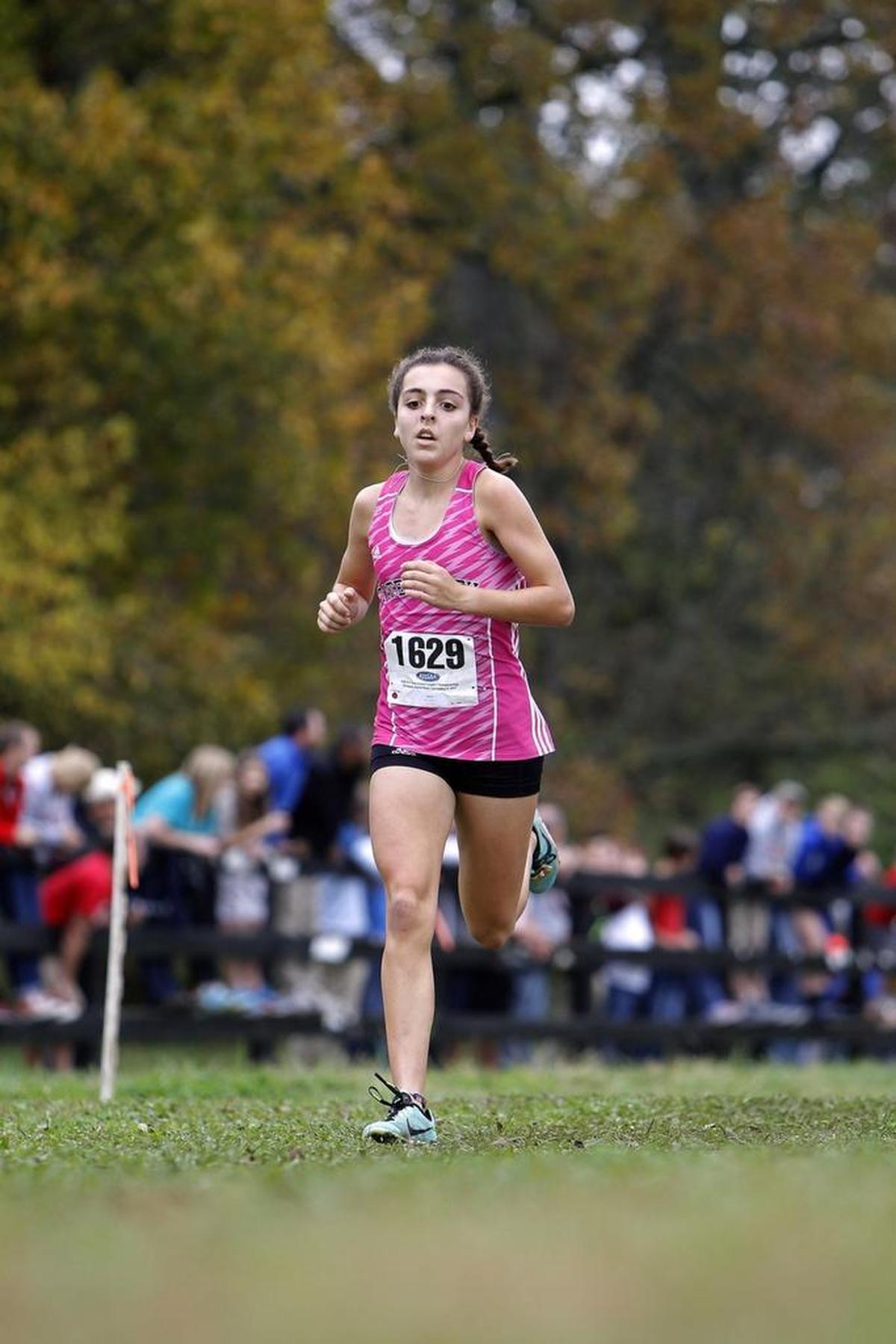 Tates Creek's Jenna Strange runs second in the KHSAA Class 3A Girls' State Cross Country Championship at Kentucky Horse Park in Lexington, Ky., Saturday, November 4, 2017.
