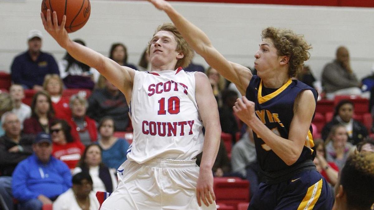 Scott County's Cooper Robb shoots against Sayre during the 42nd district tournament at Scott Co. High School in Georgetown, Ky., Monday, February 22, 2016.