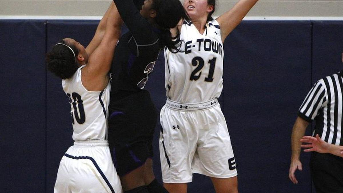 Elizabethtown's Erin Boley blocks against Bowling Green in the semifinals of the Traditional Bank Holiday Classic in the Beuter Gymnasium at Lexington Catholic High School in Lexington, Ky., Tuesday, December 22, 2015.