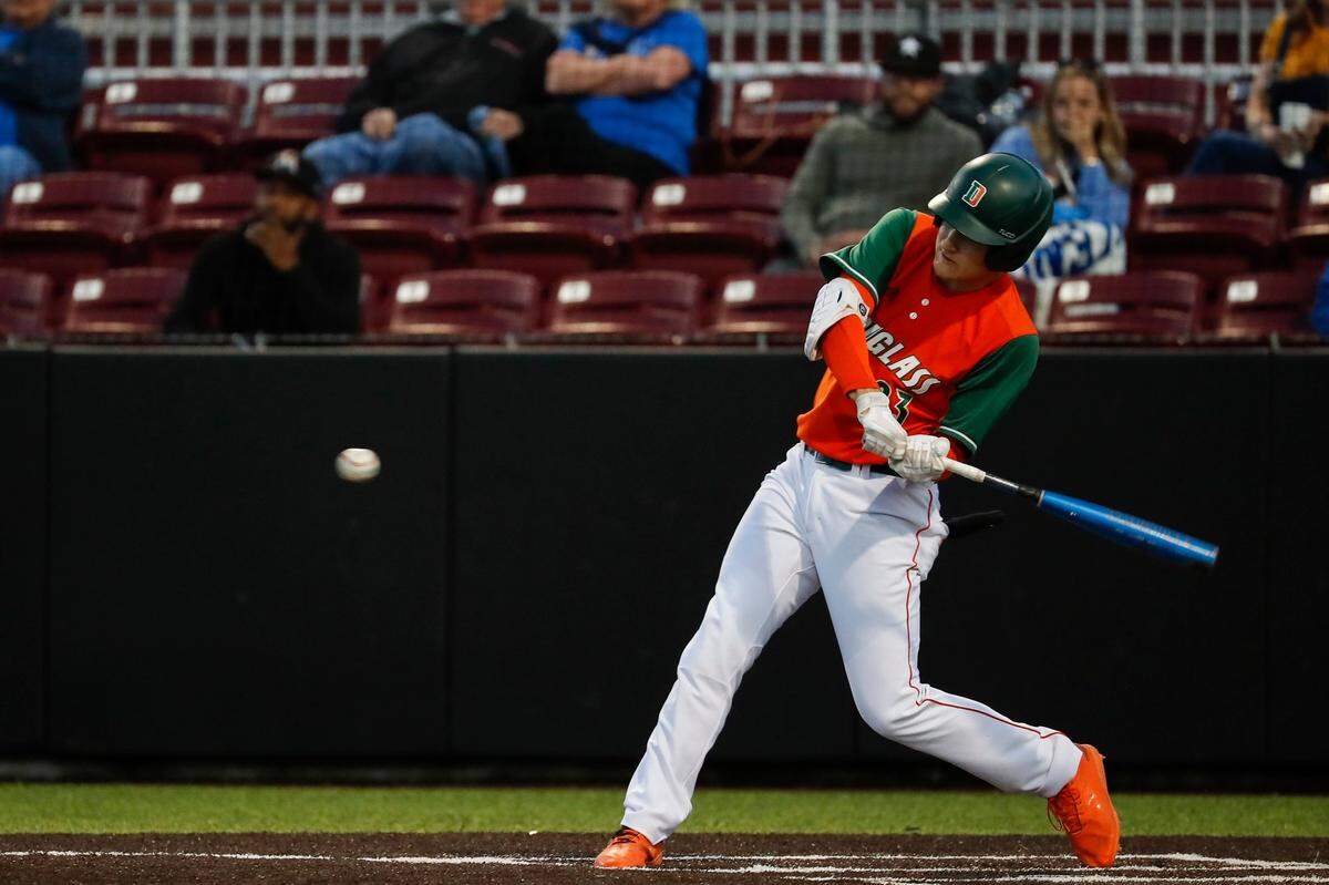 Frederick Douglass’s Leighton Harris takes a cut against Henry Clay during the teams’ game at EKU on April 13.
