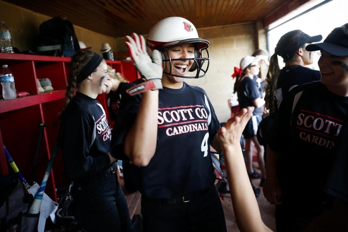 Scott County's Kennedy Sullivan (4) celebrates with teammates after her home run during their game against Woodford County at Scott County High School in Georgetown, Ky., Thursday, April 27, 2017. Scott County beat Woodford County 5-3.