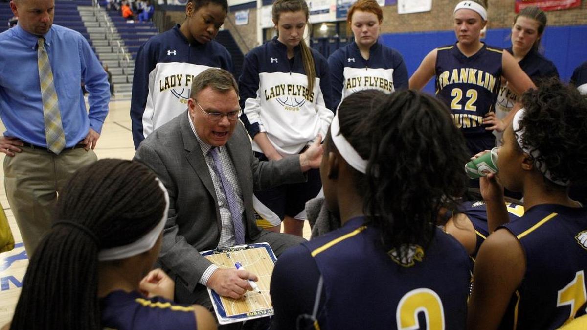 Franklin County girls’ basketball coach Joey Thacker was also offensive coordinator for the Lexington Christian Academy football team.