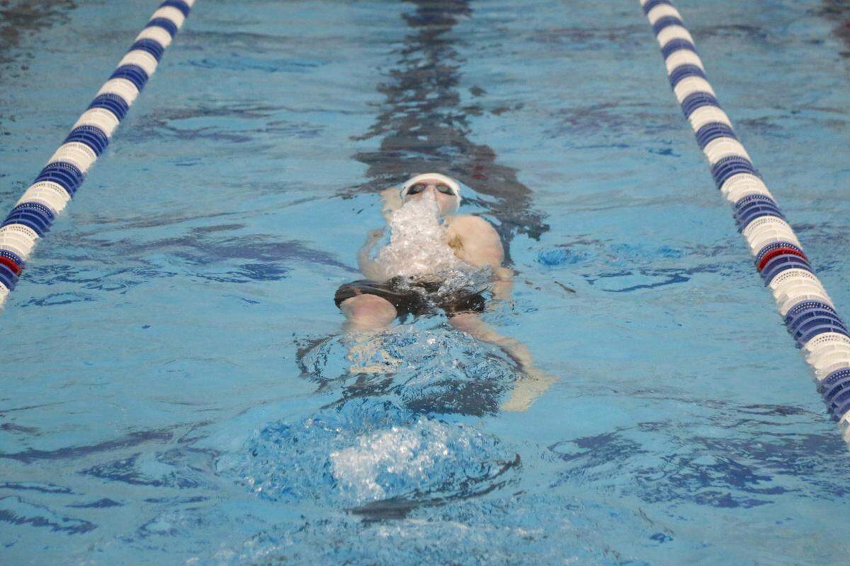 Henry Clay’s Nick Johnson defended his 100-yard backstroke title at the Region 8 Championships at Stivers Aquatic Center in Barbourville on Saturday.