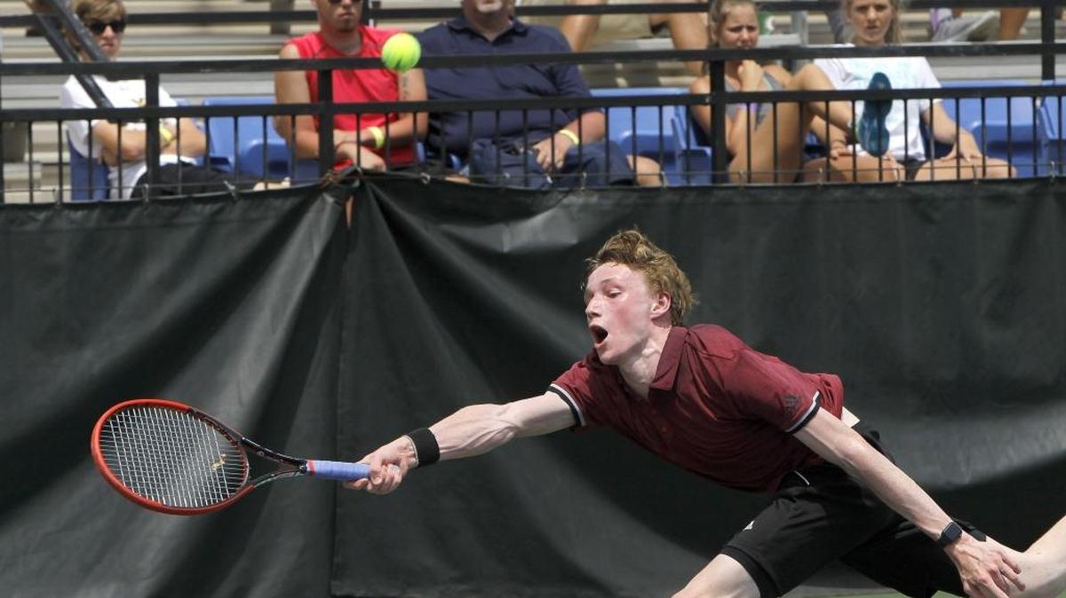 Paul Laurence Dunbar's Matt Halpin returns en route to winning the boys' singles final during the KHSAA state tennis championship at the Boone Tennis Center in Lexington, Ky., Saturday, May 20, 2017.