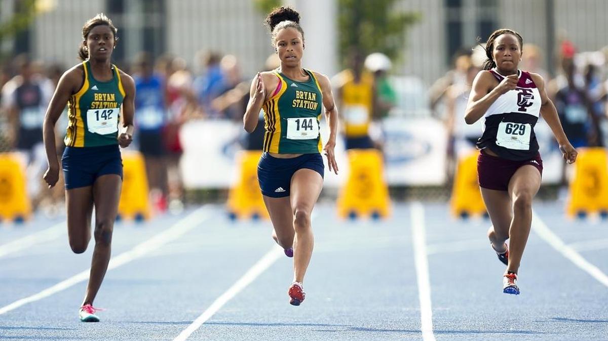 Bryan Station's Queenie Livingston (142) Bryan Station's Brooke Raglin (144) and Tates Creek's Rosalynd Hollingsworth (629) compete in the girls 100-meter dash during the 2017 KHSAA Track & Field 3A State Meet at the University of Kentucky in Lexington, Ky., Saturday, May 20, 2017. Raglin won with a time of 11.79.