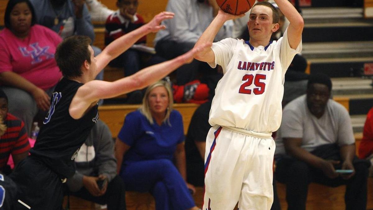 Lafayette's Harrison lane shoots a 3-pointer against LexCath in the semifinals of the 43rd district basketball tournament at Lafayette's Jackson Carlisle Gymnasium in Lexington, Ky., Tuesday, February 22, 2016.