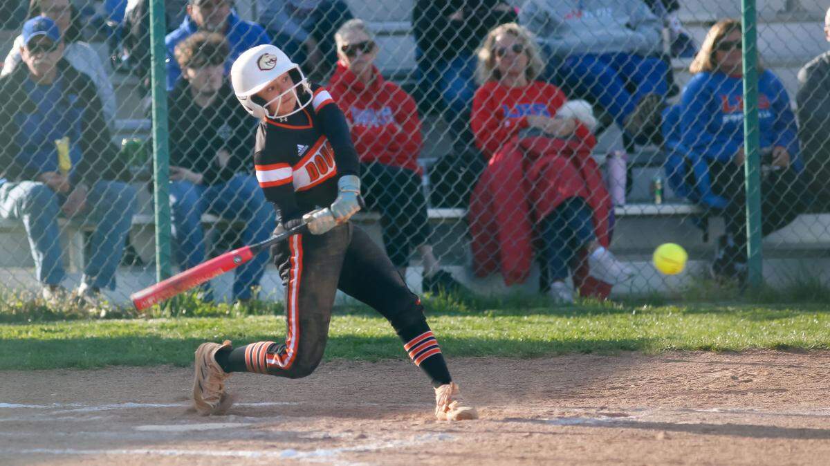 Frederick Douglass freshman Emma Dunn sized up a pitch that she knocked over the fence for a solo home run against Lafayette at Lafayette High School on Monday, Jan. 22, 2024.
