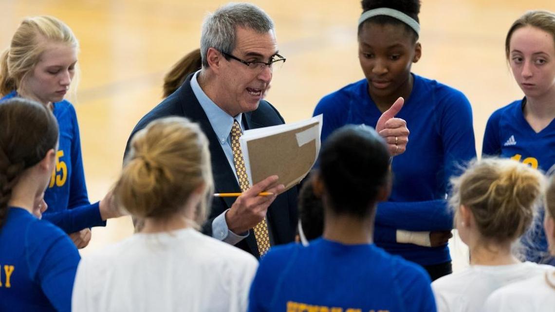 Henry Clay head coach Dale Grupe gives direction to his team during a time out. Sacred Heart Academy defeated Henry Clay 3-1 to win the KHSAA Volleyball Championship, Sunday, Nov. 06, 2016 at Valley High School's J.C. Cantrell Gymnasium in Louisville.