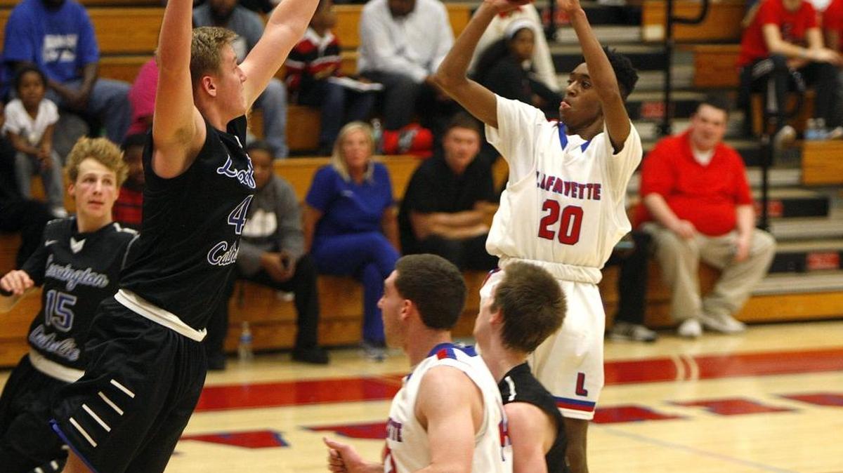 Senior guard Chris Wharton (20) leads a speedy Lafayette team that has hopes of contending for an 11th Region crown.
