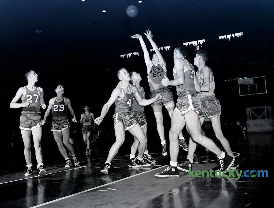 Wayland’s “King” Kelly Coleman (66) put up a shot over Carr Creek during their semifinal game in the state tournament on March 17, 1956, at Memorial Coliseum in Lexington. Carr Creek defeated the Wasps 68-67 on a last-second shot.