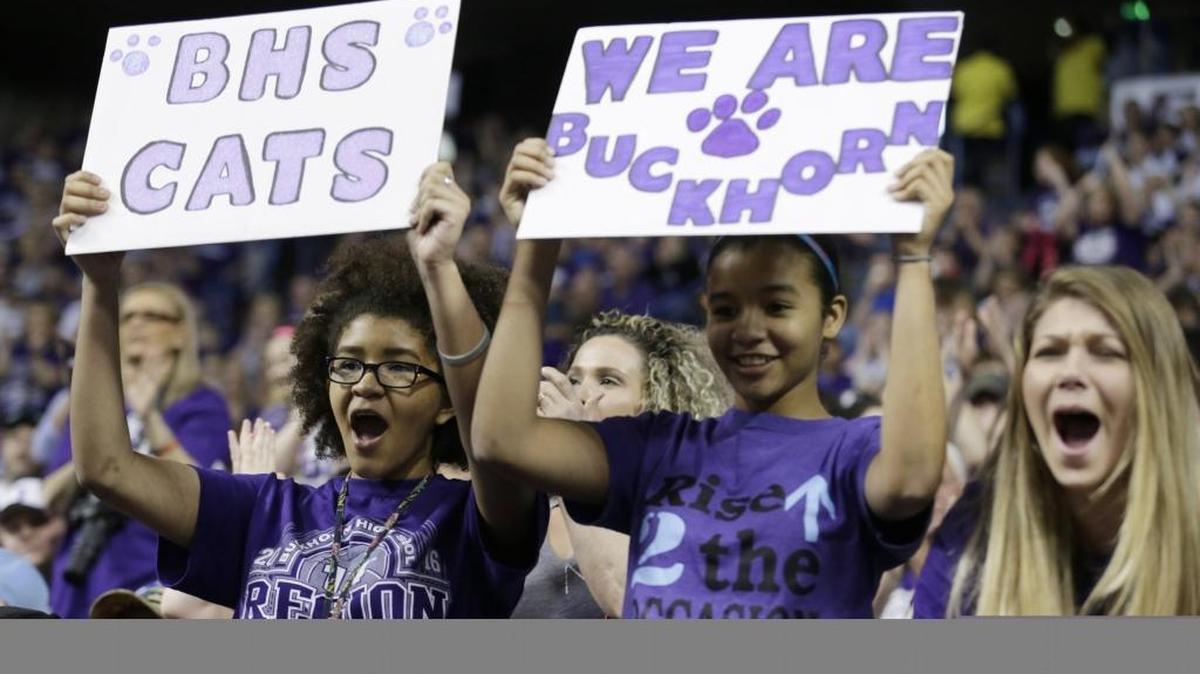 From left, Rebecca Lopez, 16, her sister Allyson Lopez, 15, and Abigail Griffith, 15, cheered for Buckhorn in the second quarter of the Murray vs. Buckhorn game at the Sweet Sixteen in Rupp Arena last week.