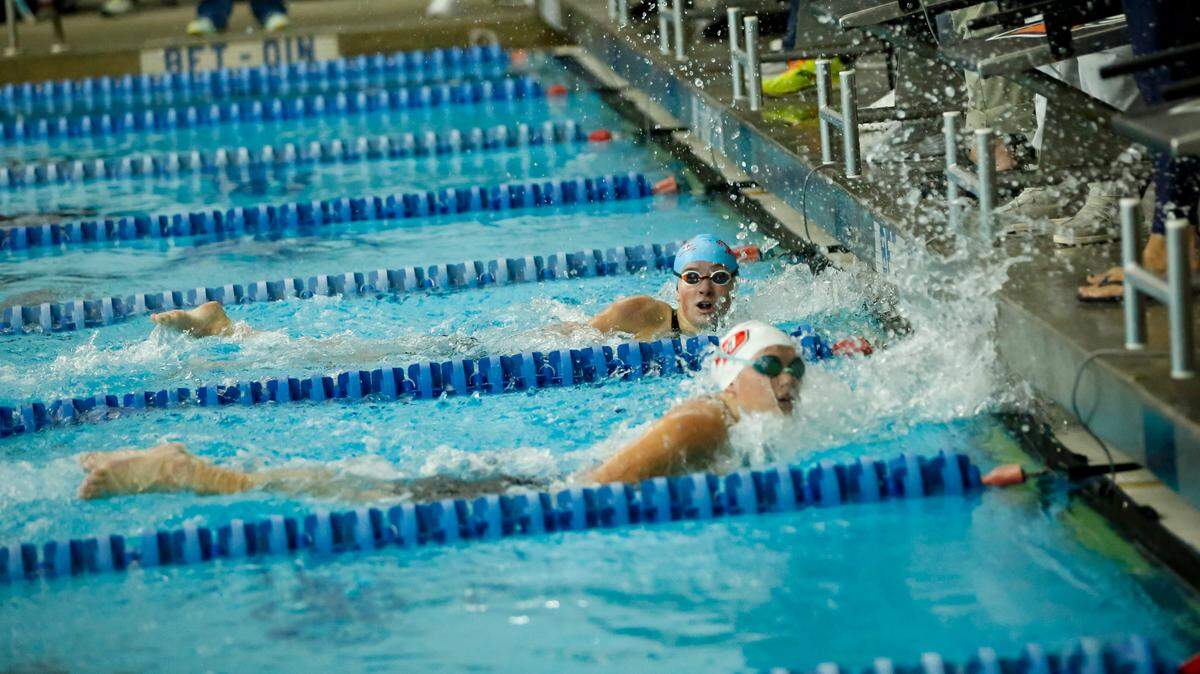 Lafayette’s Lauren Wedeking, top, out-touched Paul Laurence Dunbar’s Amelia Jones to win the 200-yard freestyle at the Region 8 Swimming and Diving Championships as Stivers Aquatic Center in Barbourville last year. She repeated as champ this season.