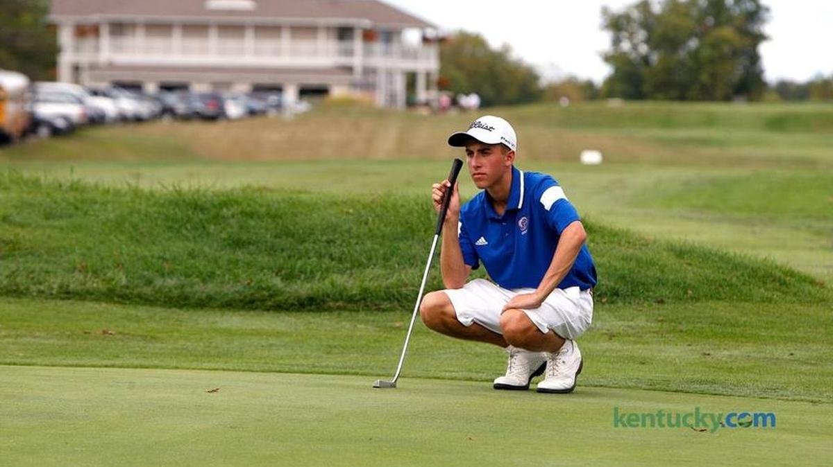 Madison Central's Zach Miller assesses his putt at the 11th region boys' golf tournament at Kearney Hill Golf Links in Lexington, Ky., Monday, September 28, 2015.