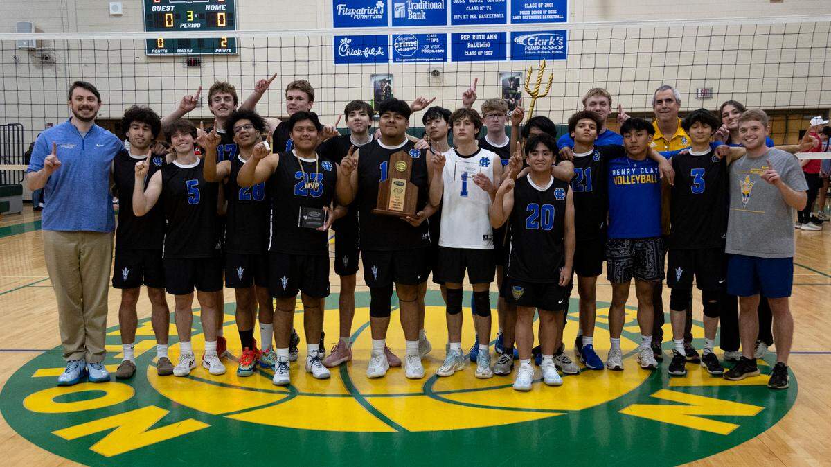 Henry Clay celebrates winning the first 7th Region boys volleyball tournament championship in state history at Bryan Station High School on Monday.
